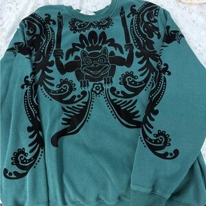 Disney Green and Black Crewneck Sweater with Elegant Patterns